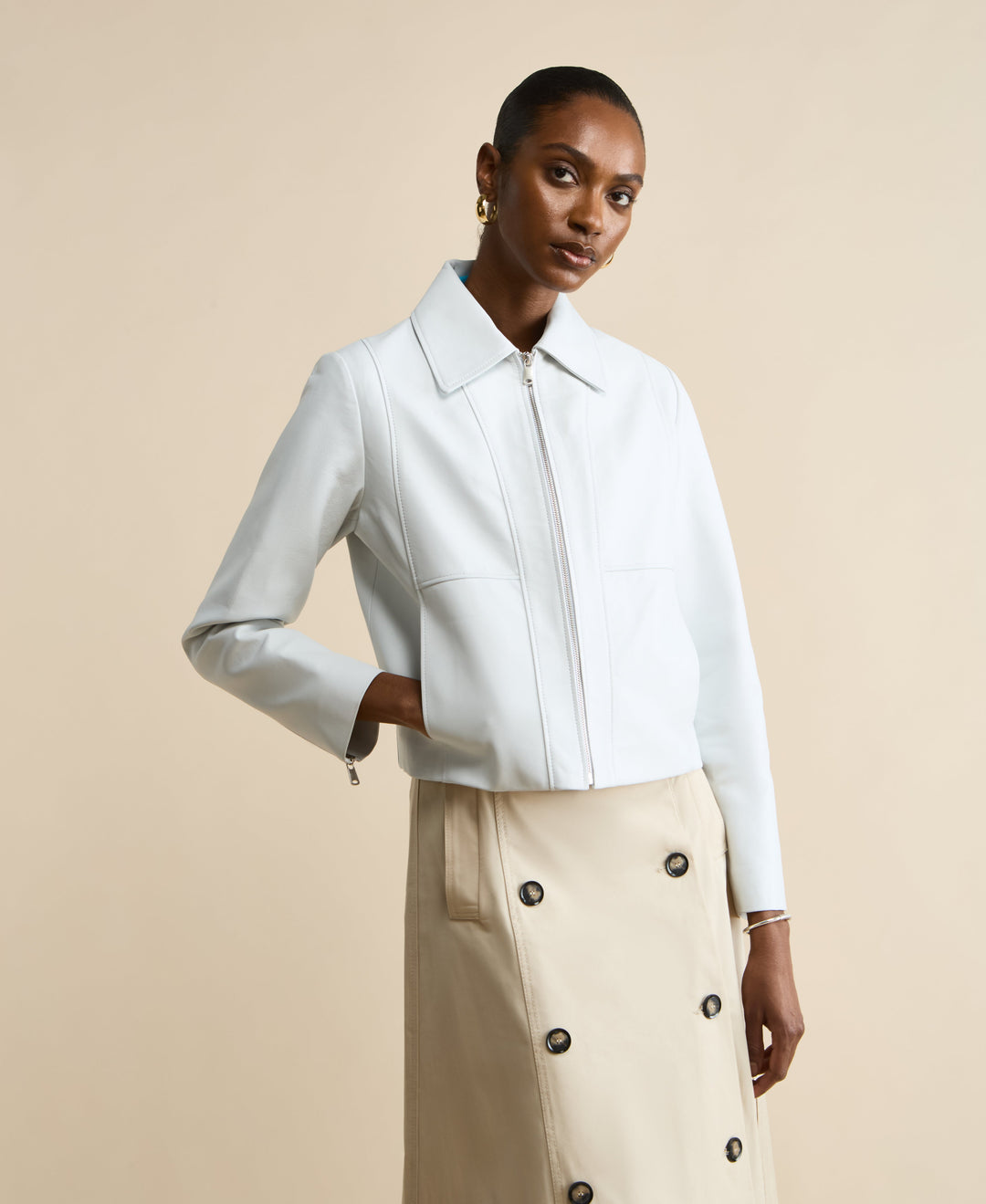 Pale blue leather jacket on model