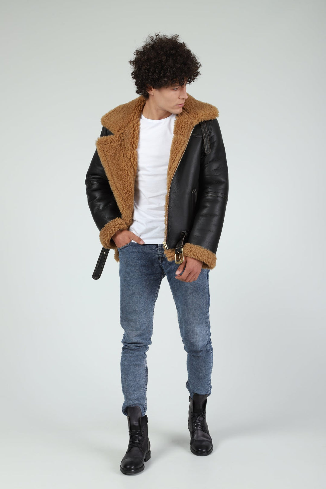 Male model wearing black sheepskin aviator jacket