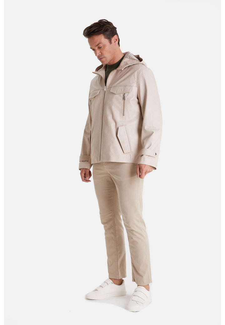 Male in beige hooded leather jacket