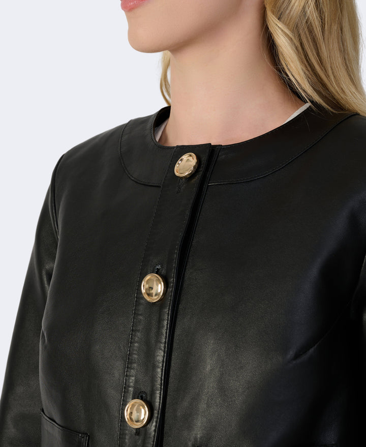 Black leather jacket with gold buttons