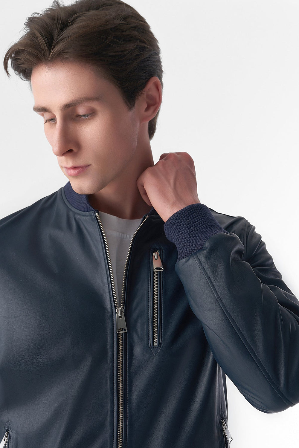Male model wearing navy leather jacket