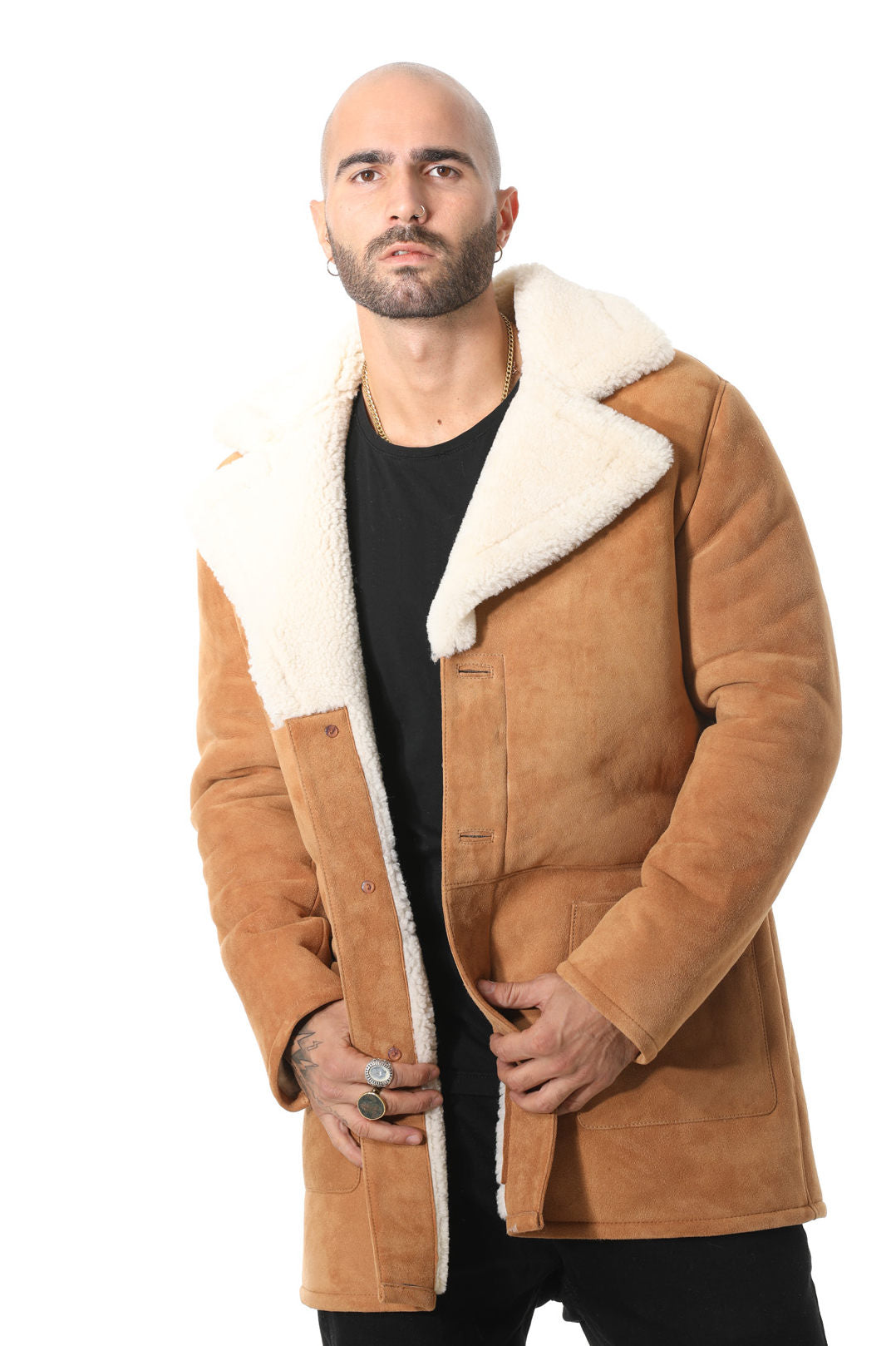 Male model wearing tan sheepskin coat