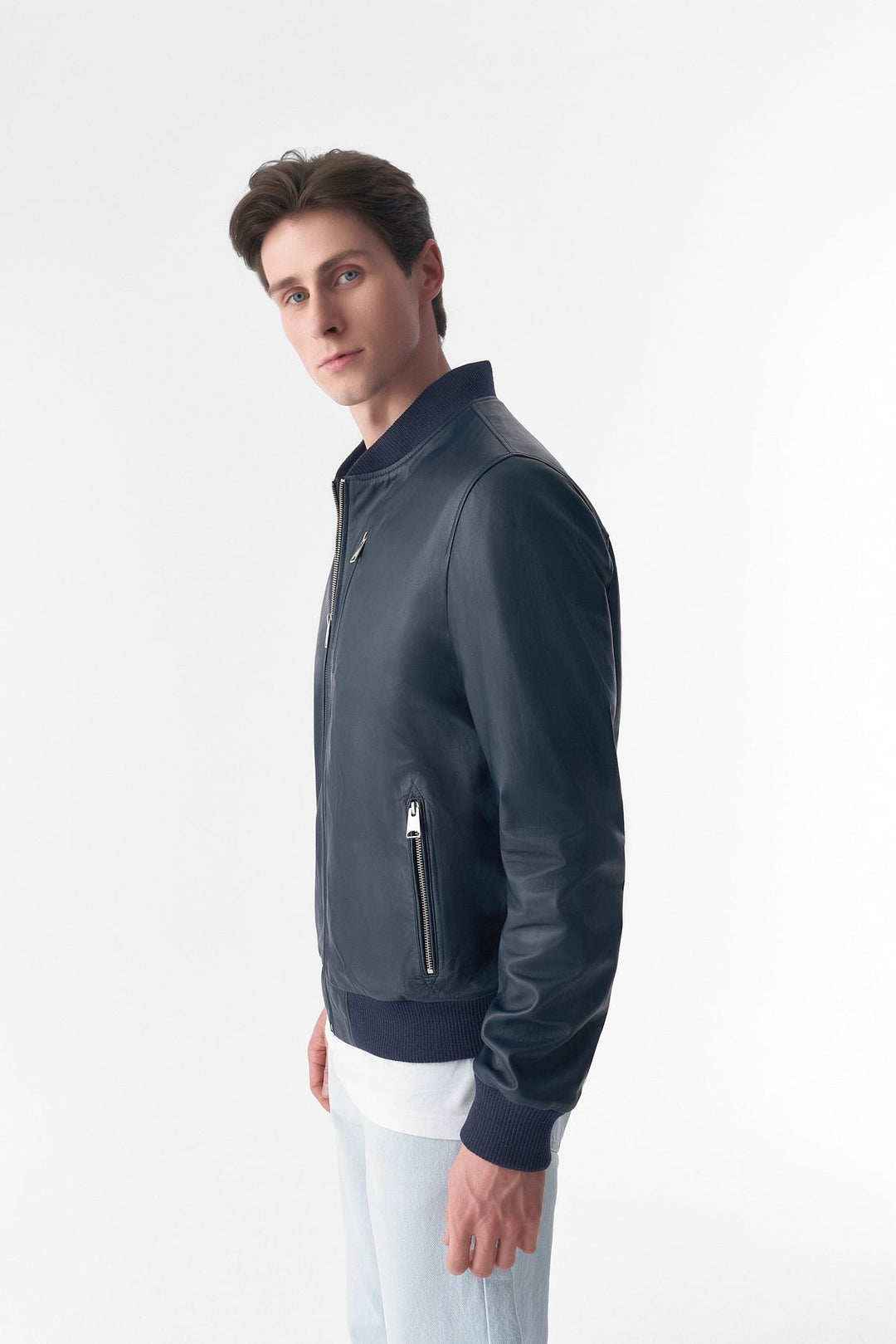 Male model wearing blue leather jacket