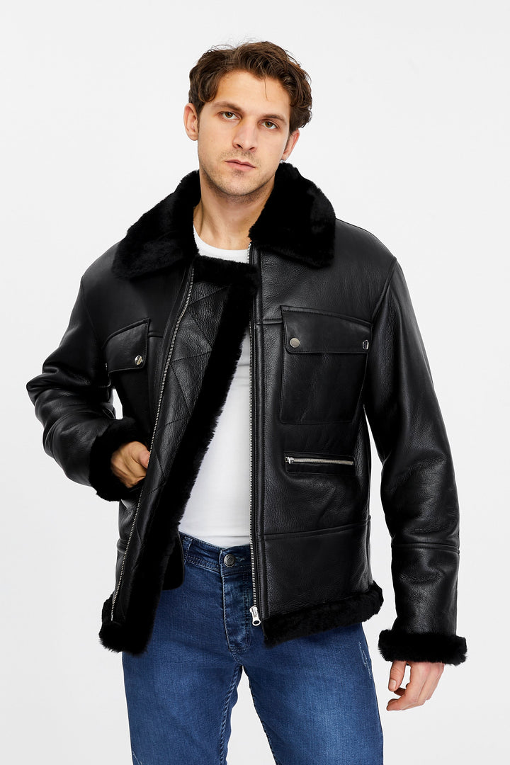 Man wearing black shearling leather jacket