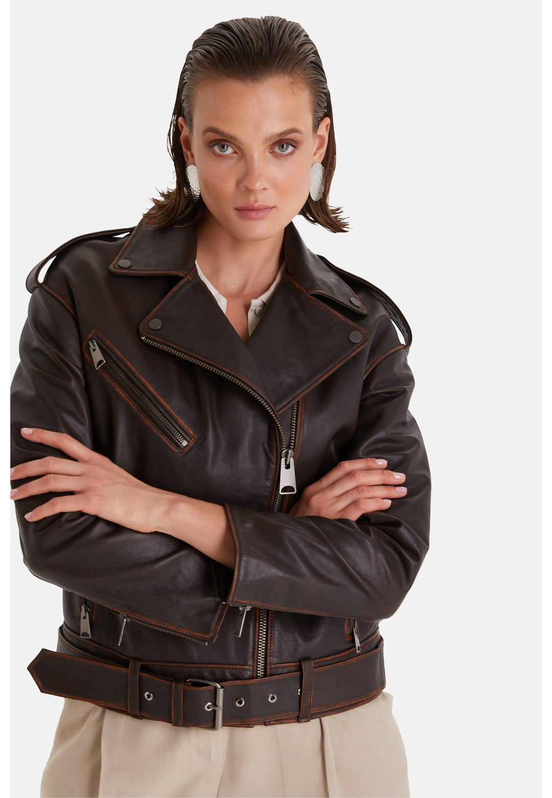 Woman wearing dark brown leather jacket
