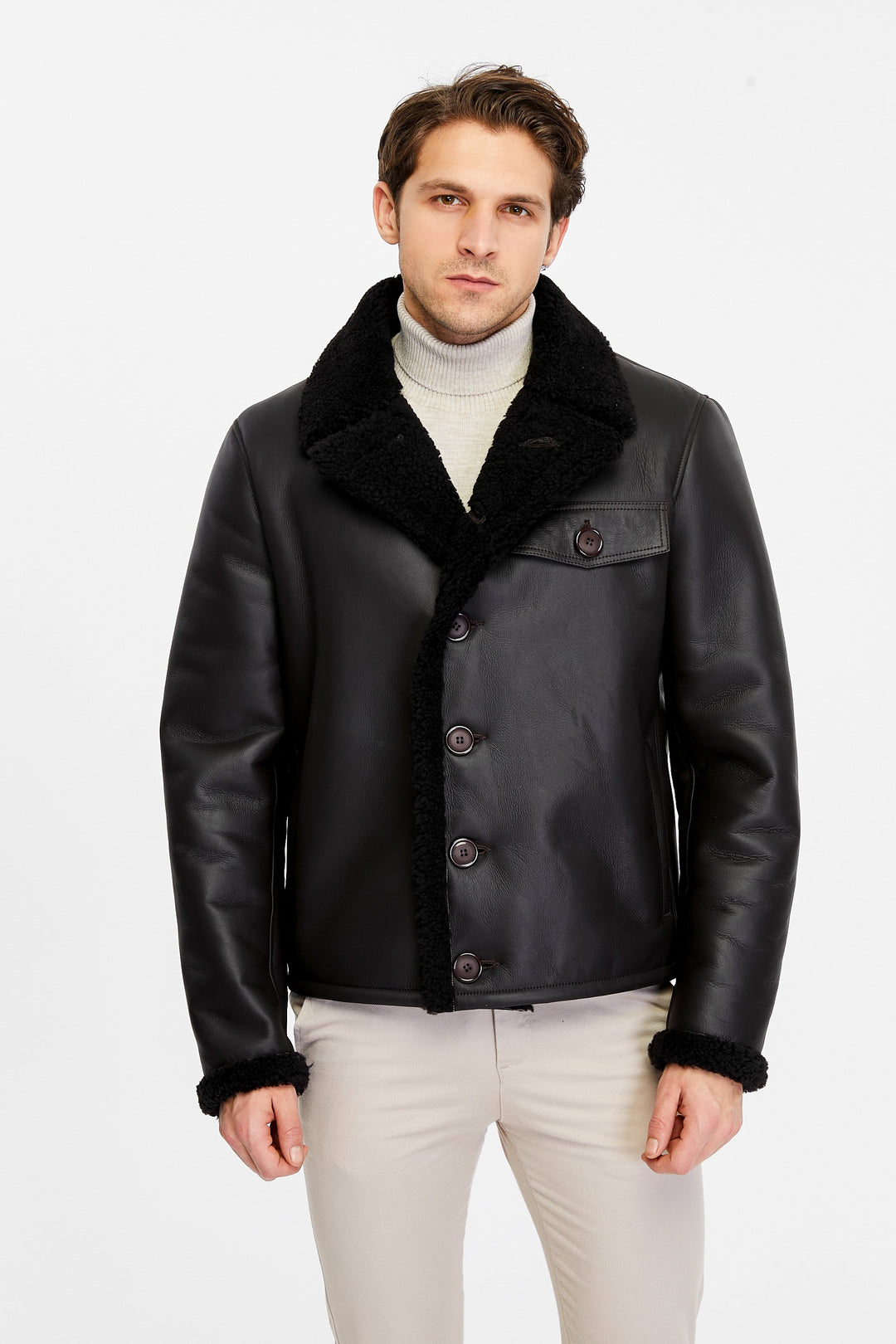 Man wearing black shearling leather jacket
