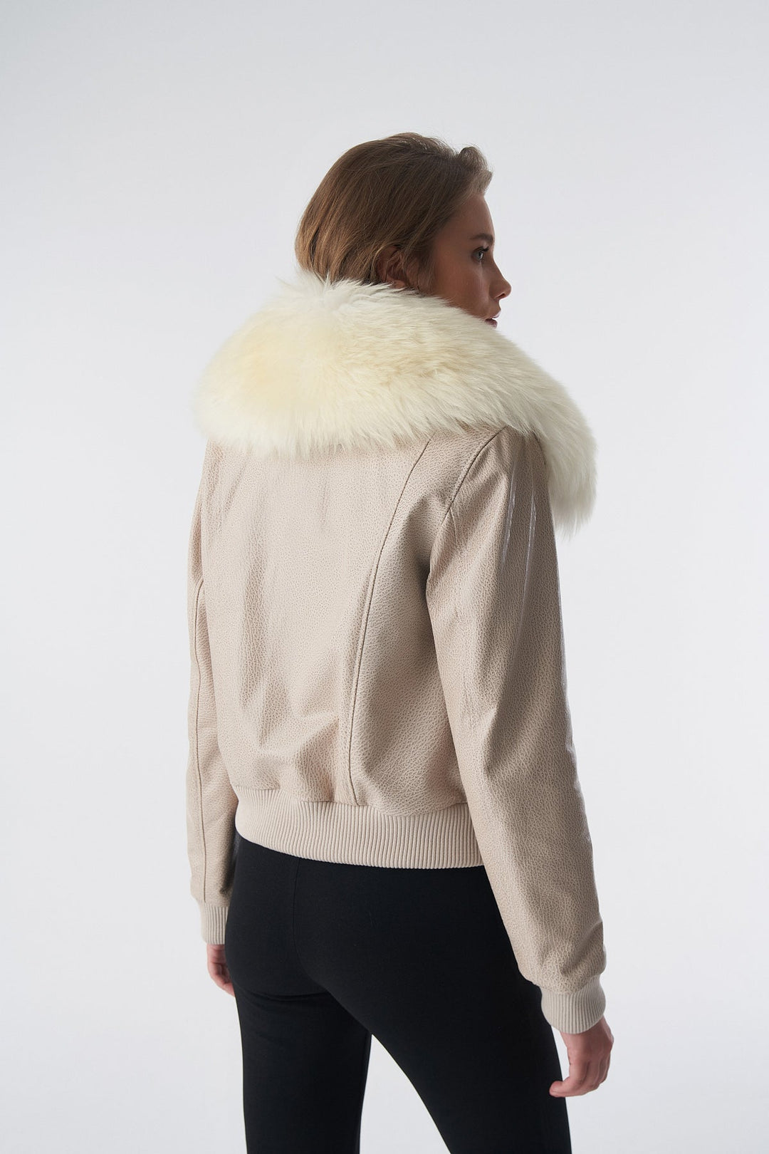Beige bomber jacket with cream fur collar