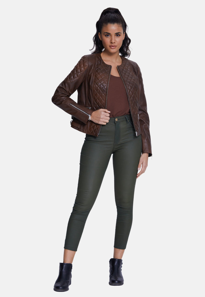 Woman wearing brown quilted leather jacket