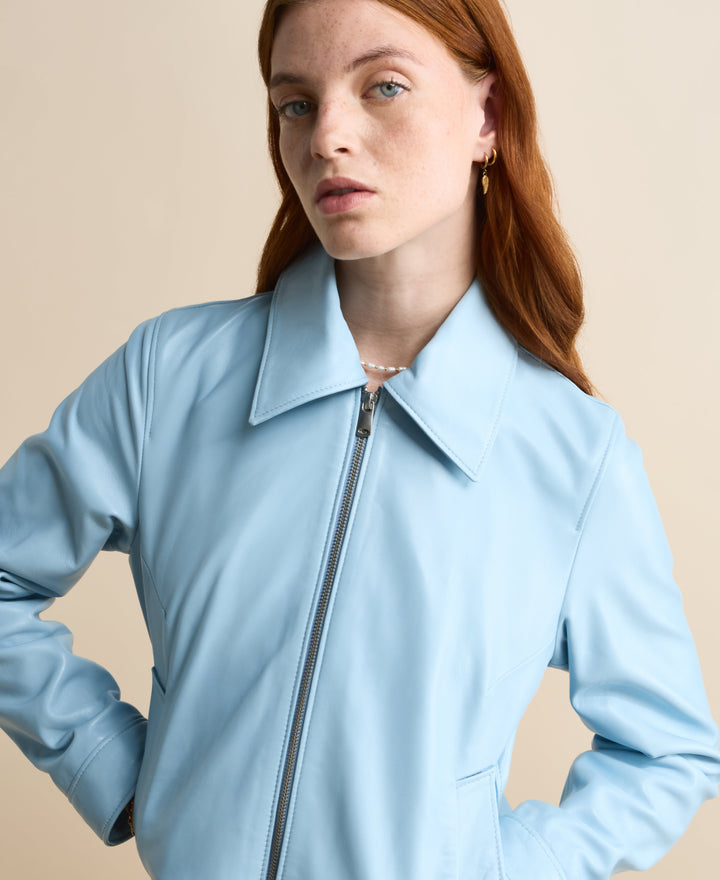 Light blue leather jacket on model