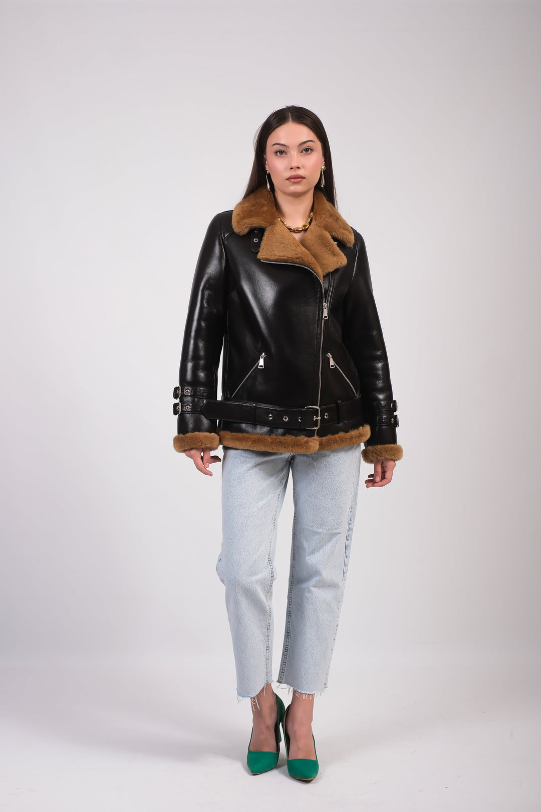 Woman wearing black shearling jacket