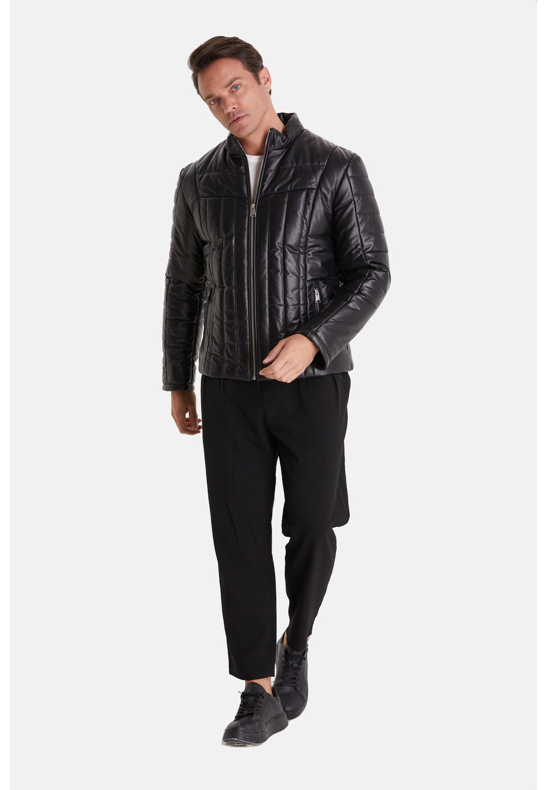 Man wearing black quilted leather jacket