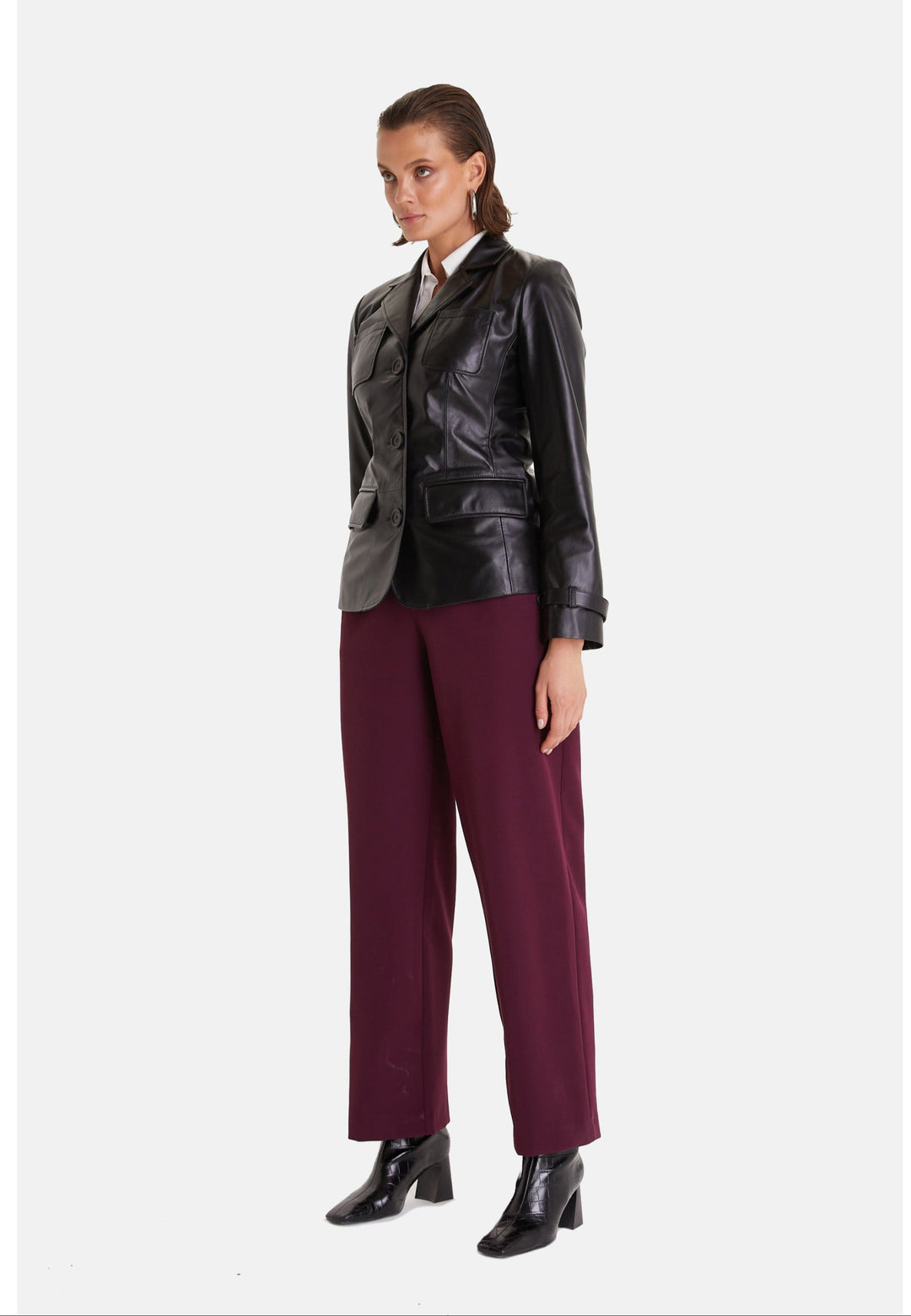 Black leather blazer on model