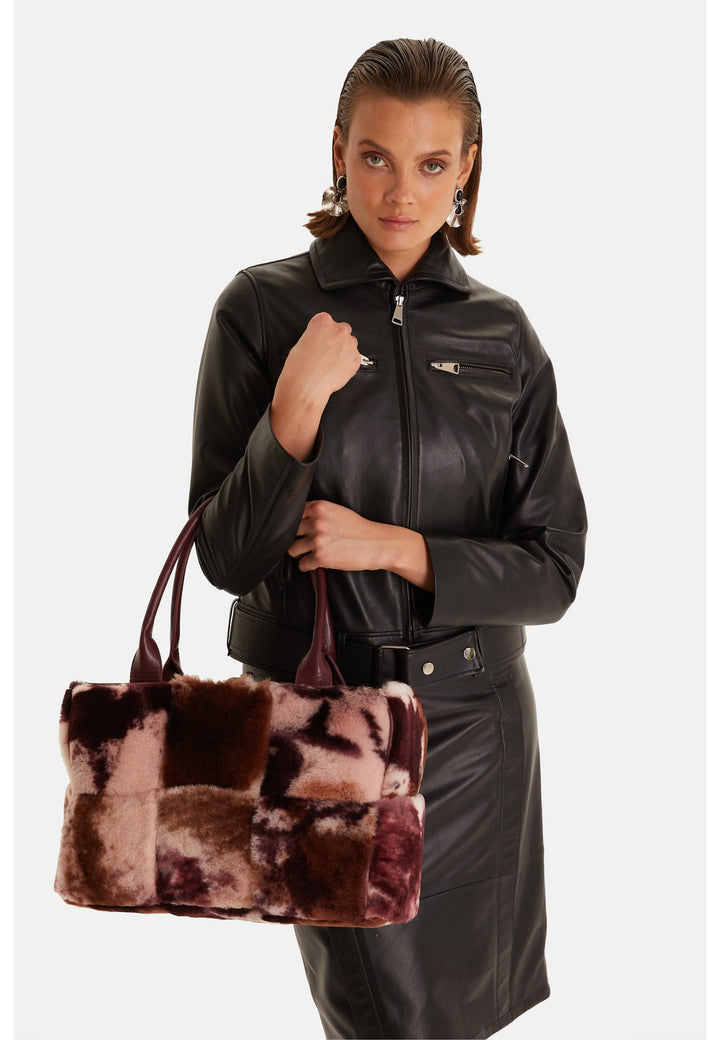 Woman wearing black leather jacket