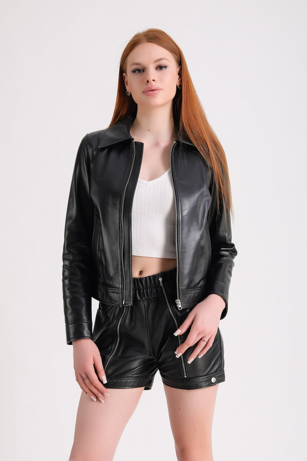 Woman wearing black leather jacket outfit