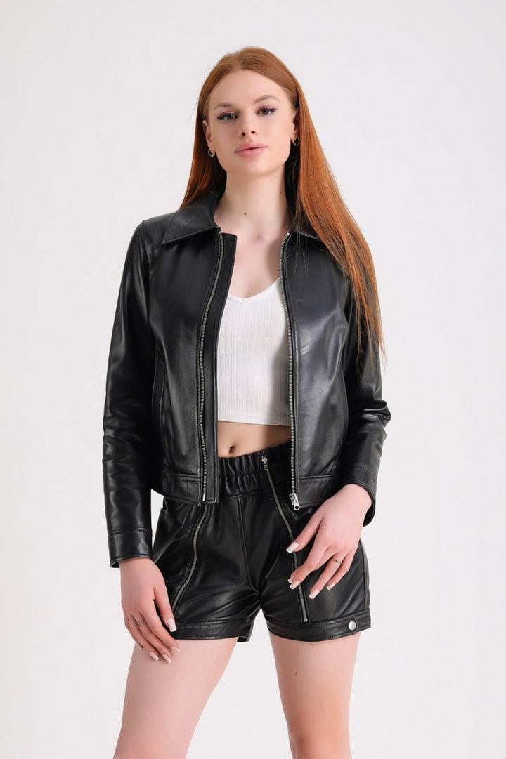 Woman wearing black leather jacket outfit