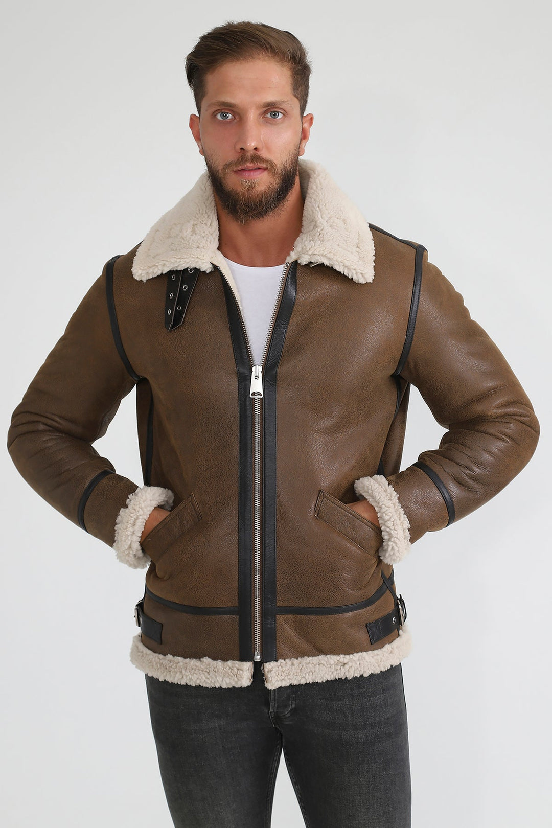 Man wearing brown shearling aviator jacket