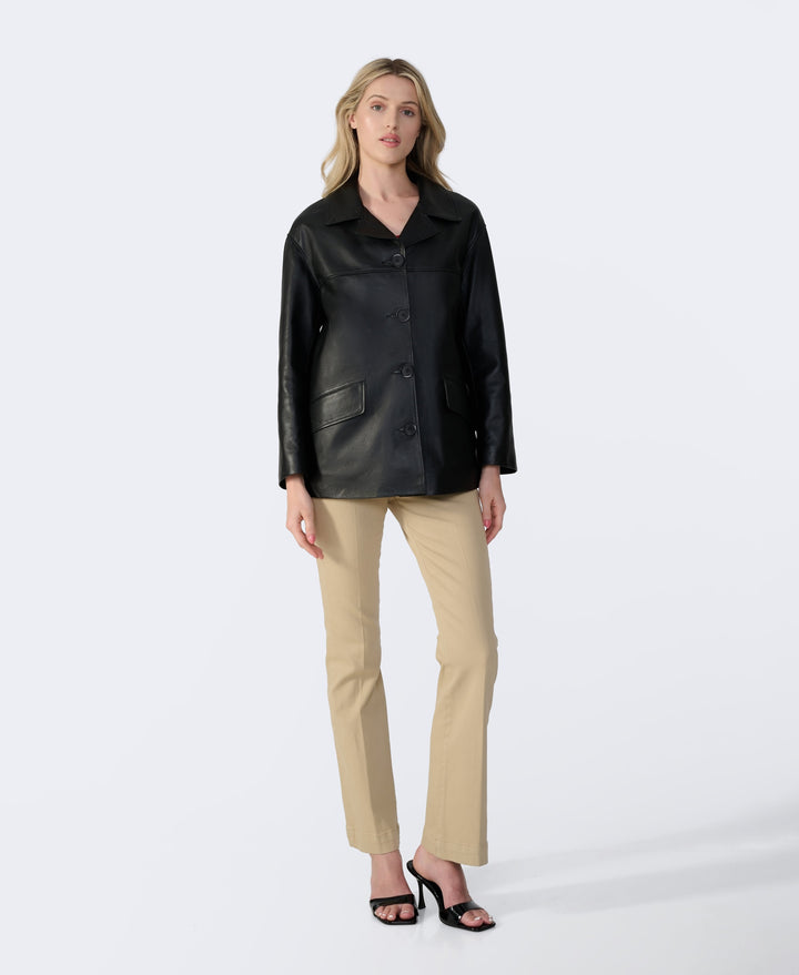 Woman wearing black leather jacket