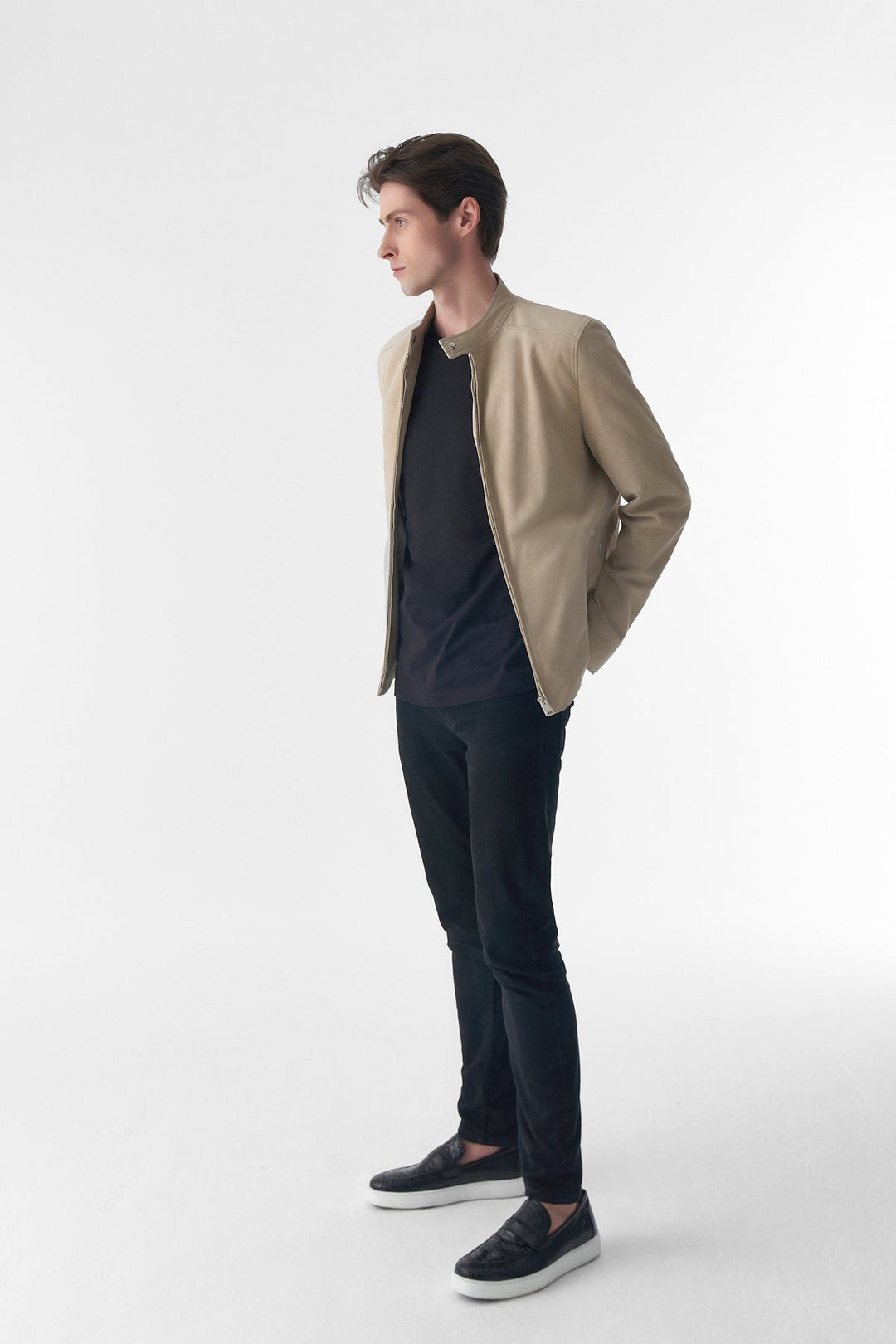Man wearing beige suede jacket