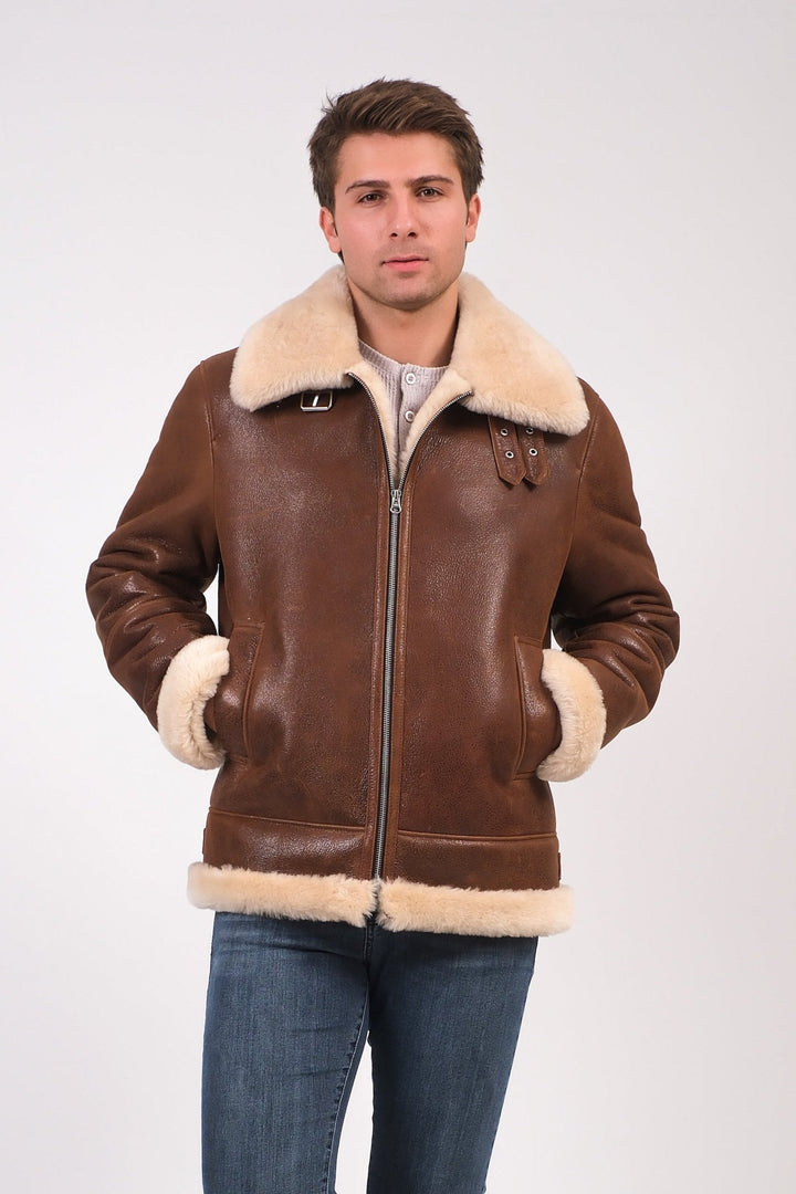 Brown shearling aviator jacket on model