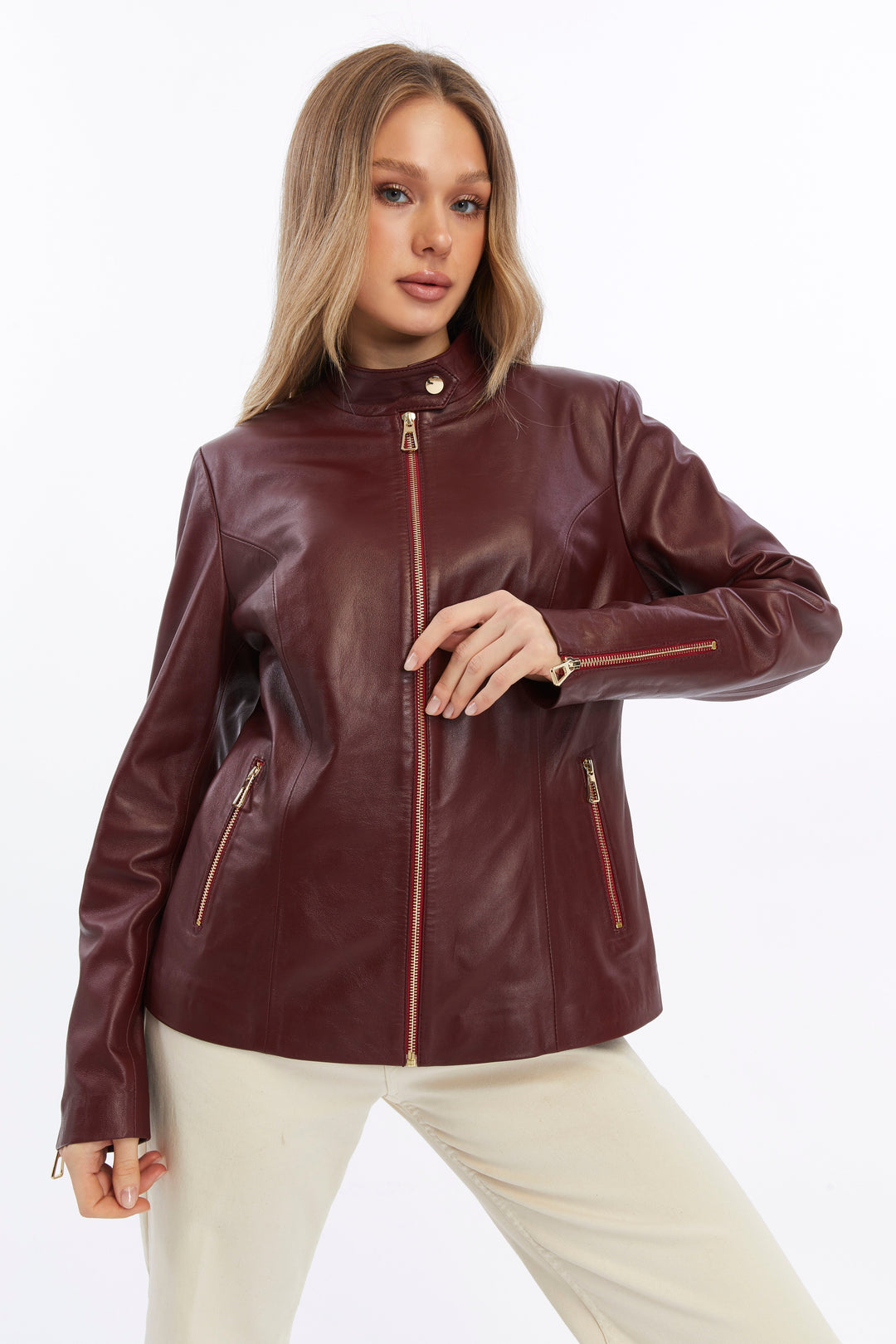 Woman wearing burgundy leather jacket