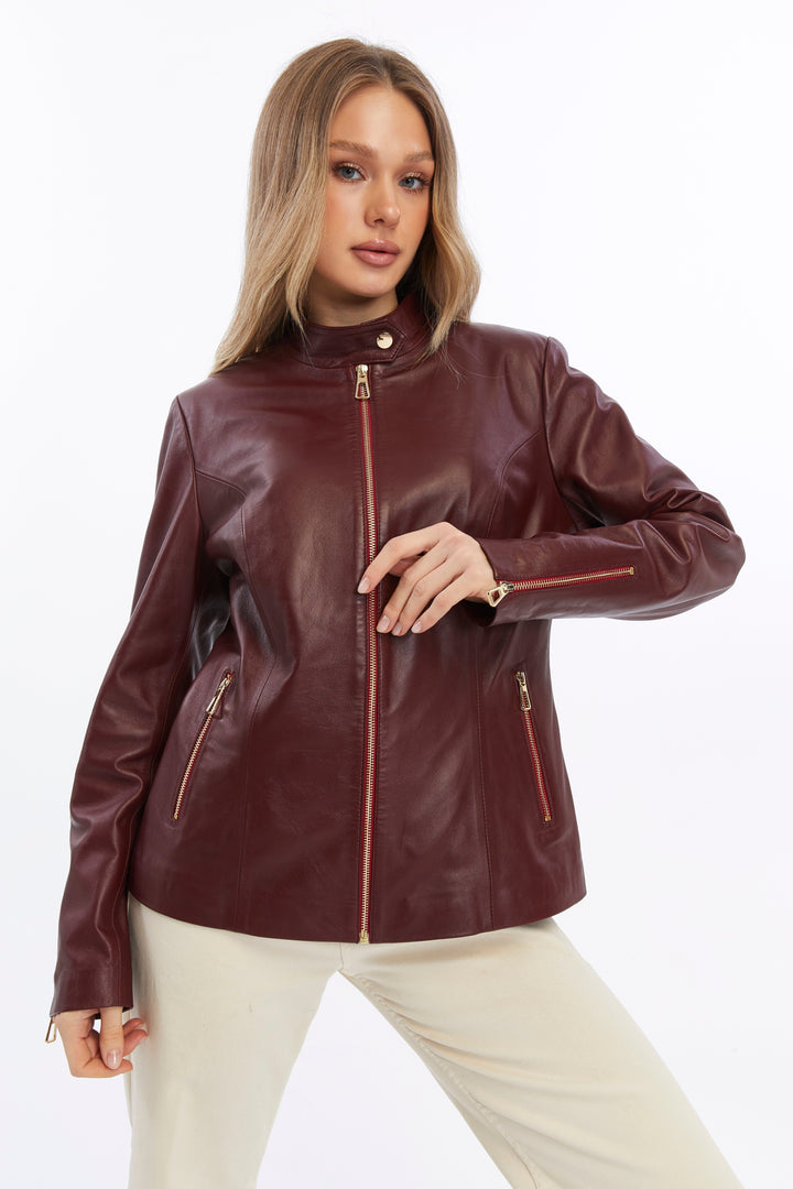 Woman wearing burgundy leather jacket