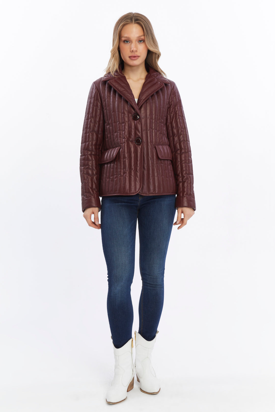 Woman wearing burgundy quilted leather coat