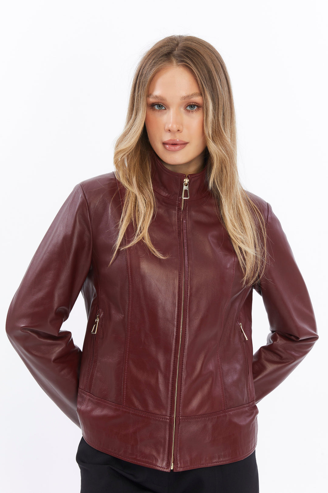 Woman wearing burgundy leather jacket