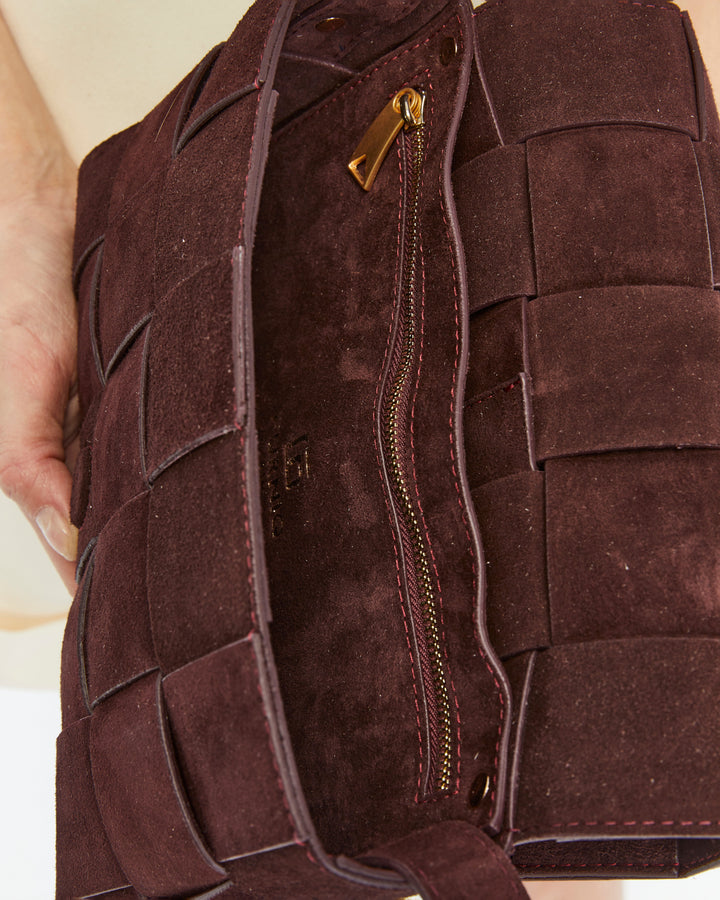 Red-brown woven suede handbag interior