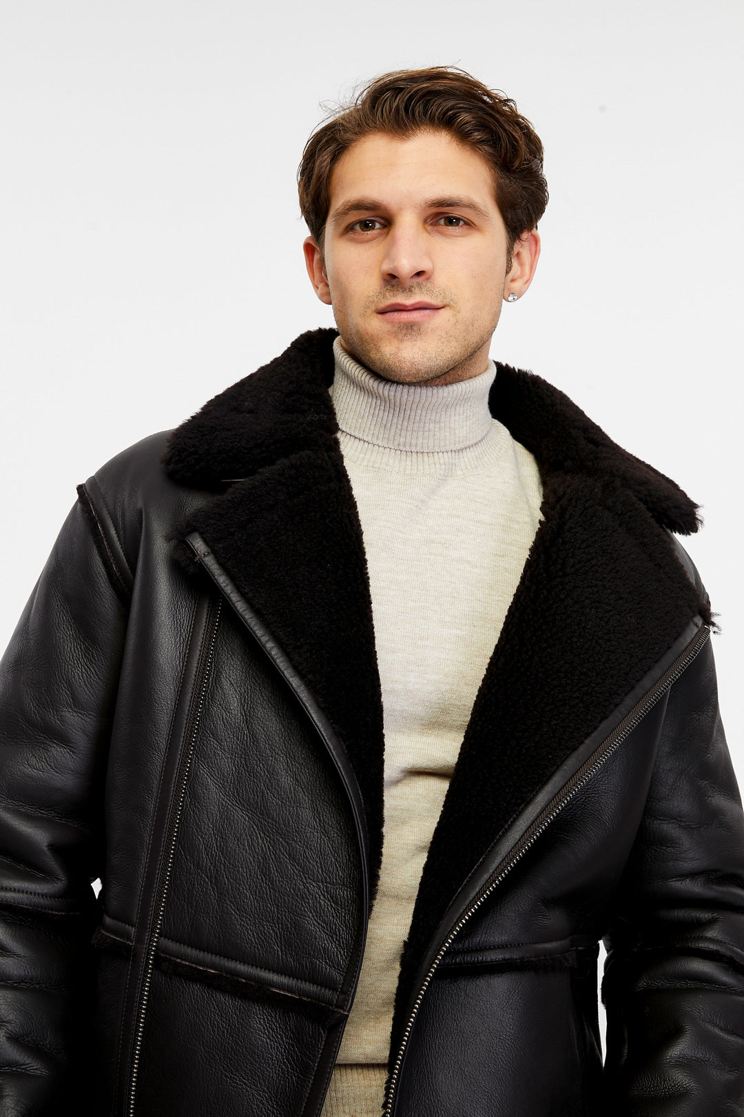 Man wearing black shearling coat