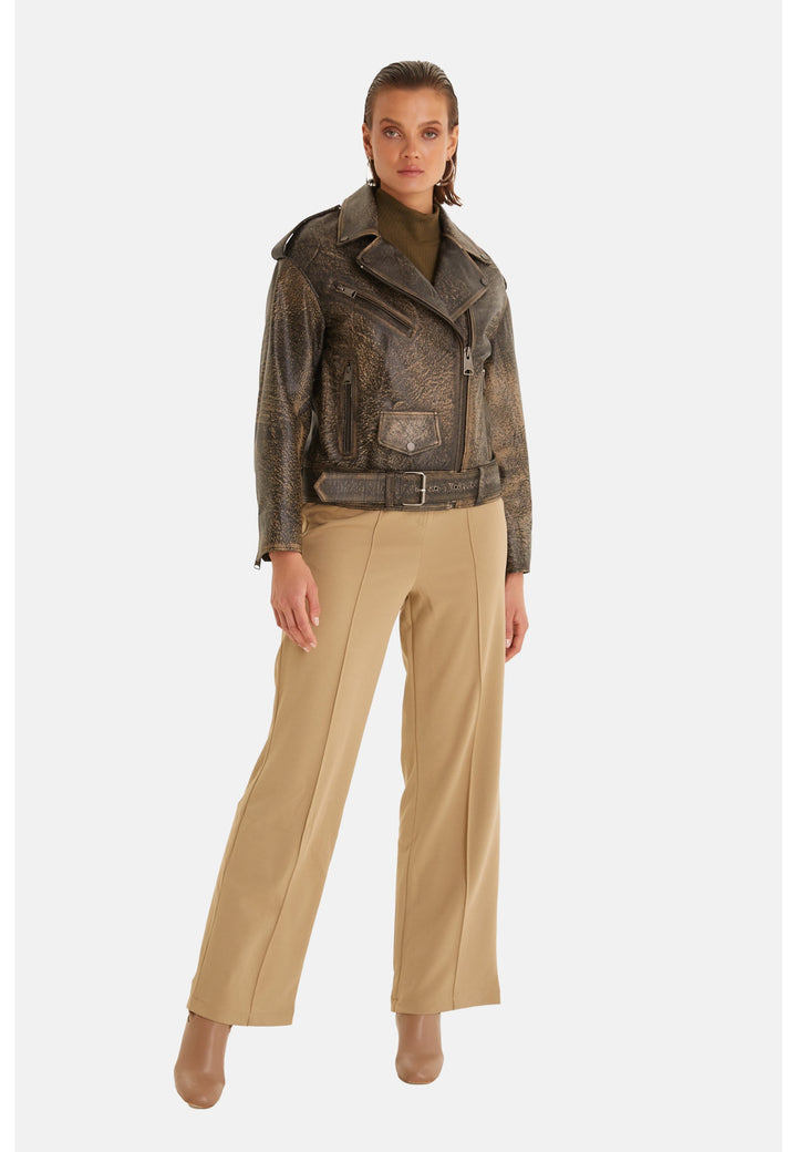 Woman wearing brown distressed leather jacket