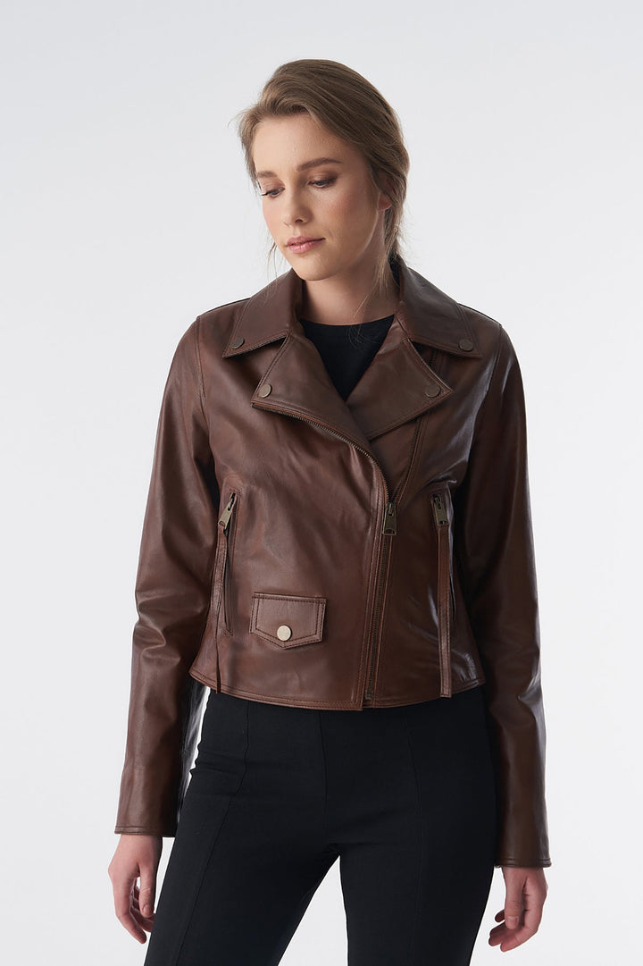 Woman wearing brown leather biker jacket