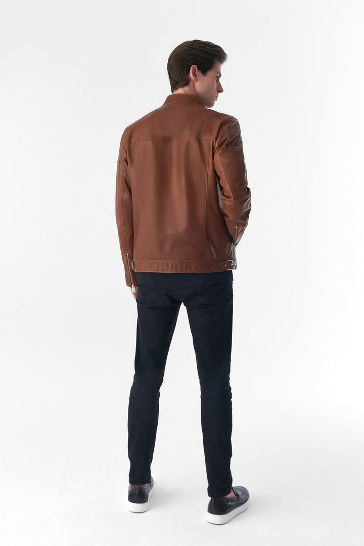 Rear view brown leather jacket on model