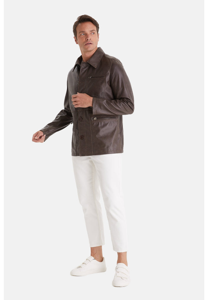 Man wearing brown leather jacket