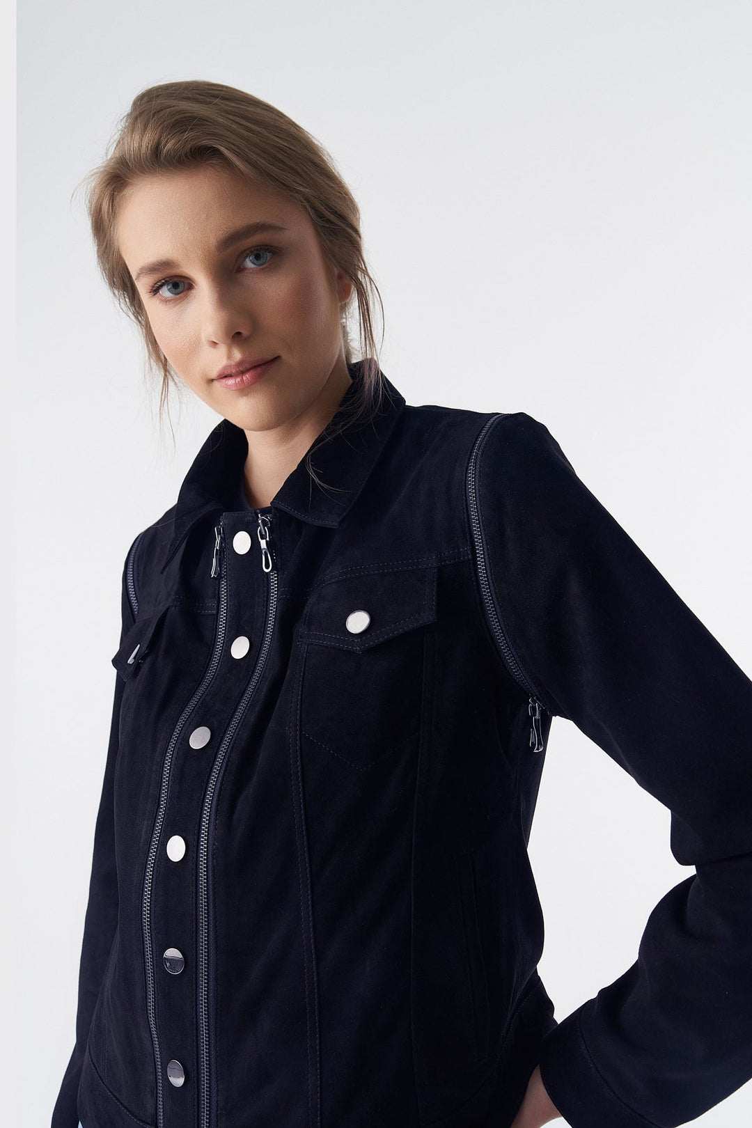 Woman wearing blue suede jacket