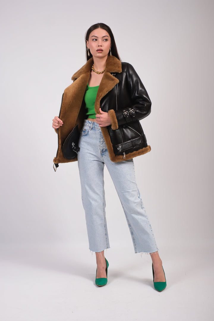 Black leather shearling jacket on model