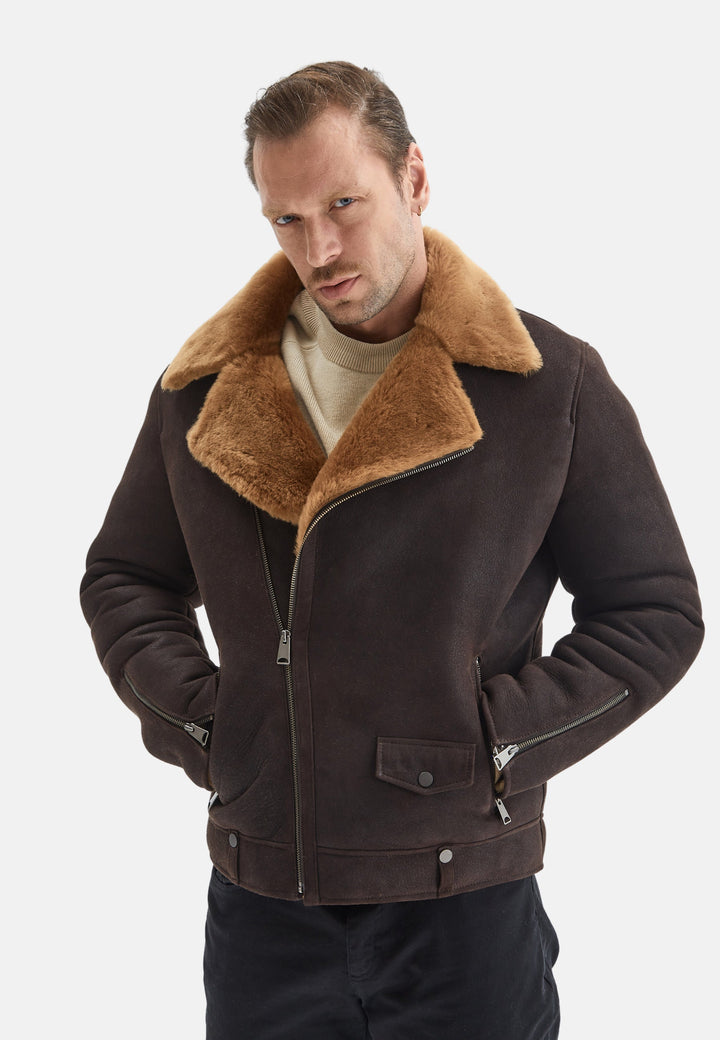 Man wearing brown shearling jacket