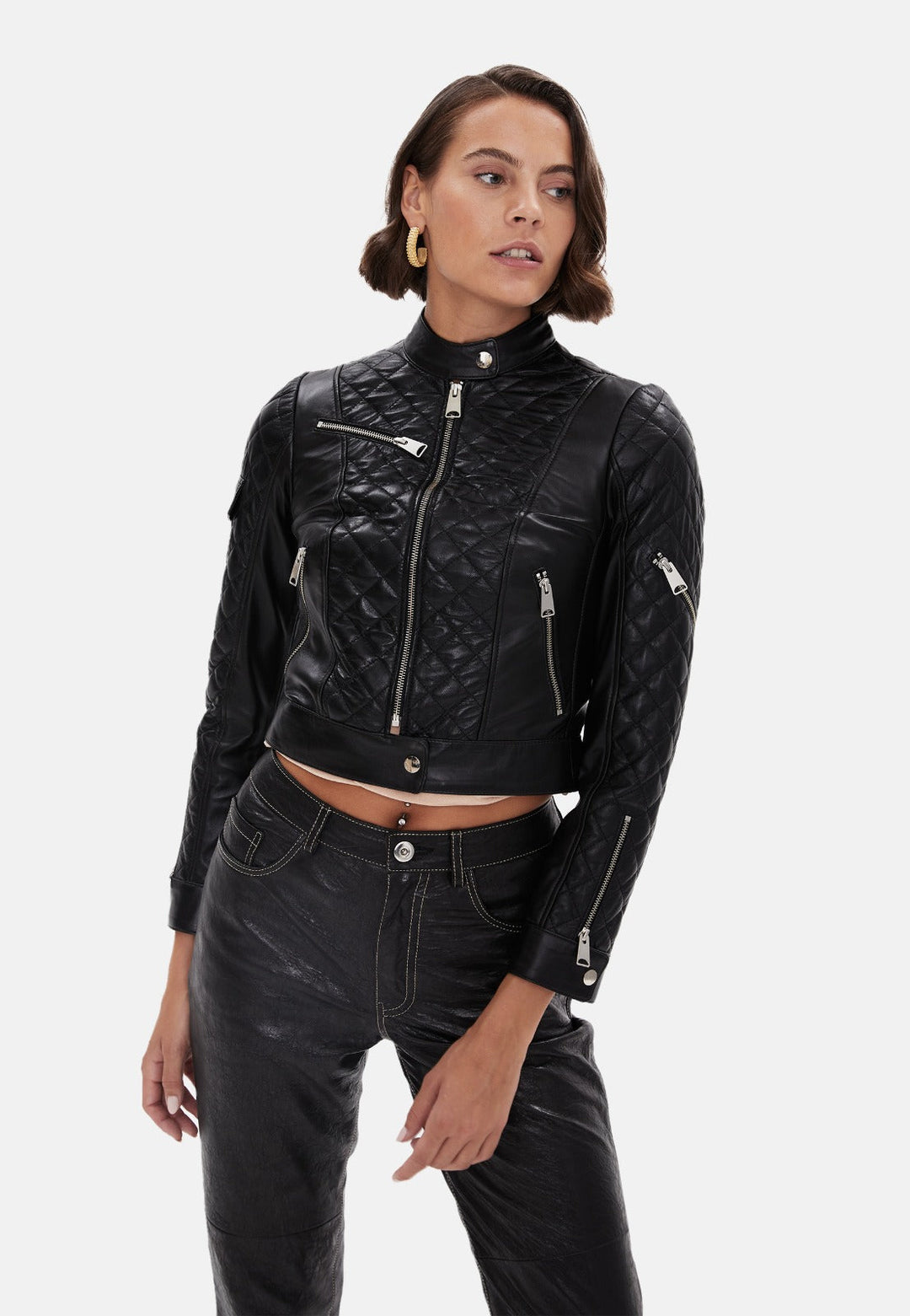 Woman wearing black quilted leather jacket