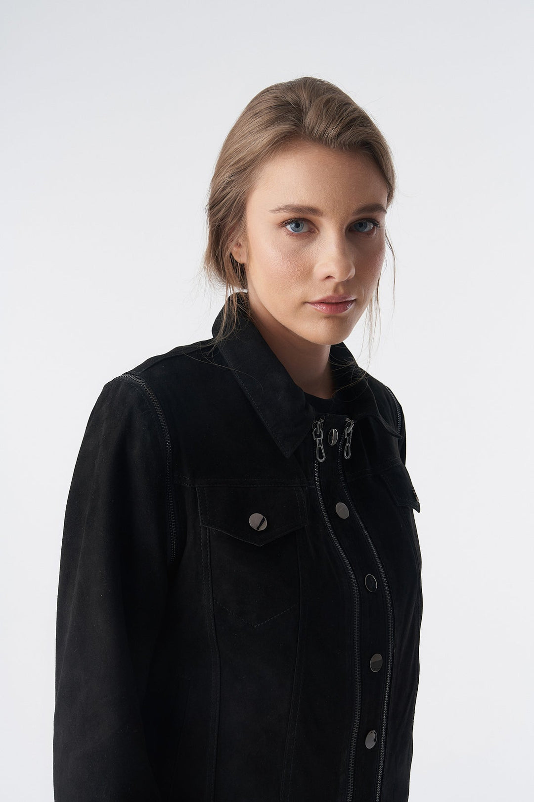 Woman wearing black suede jacket