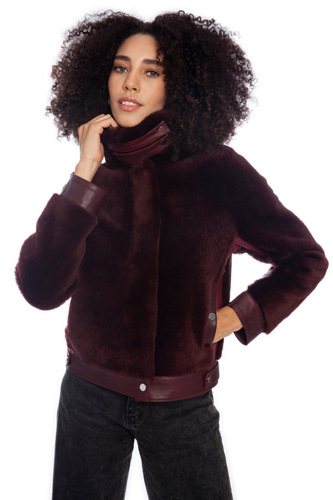 Maroon shearling jacket on female model