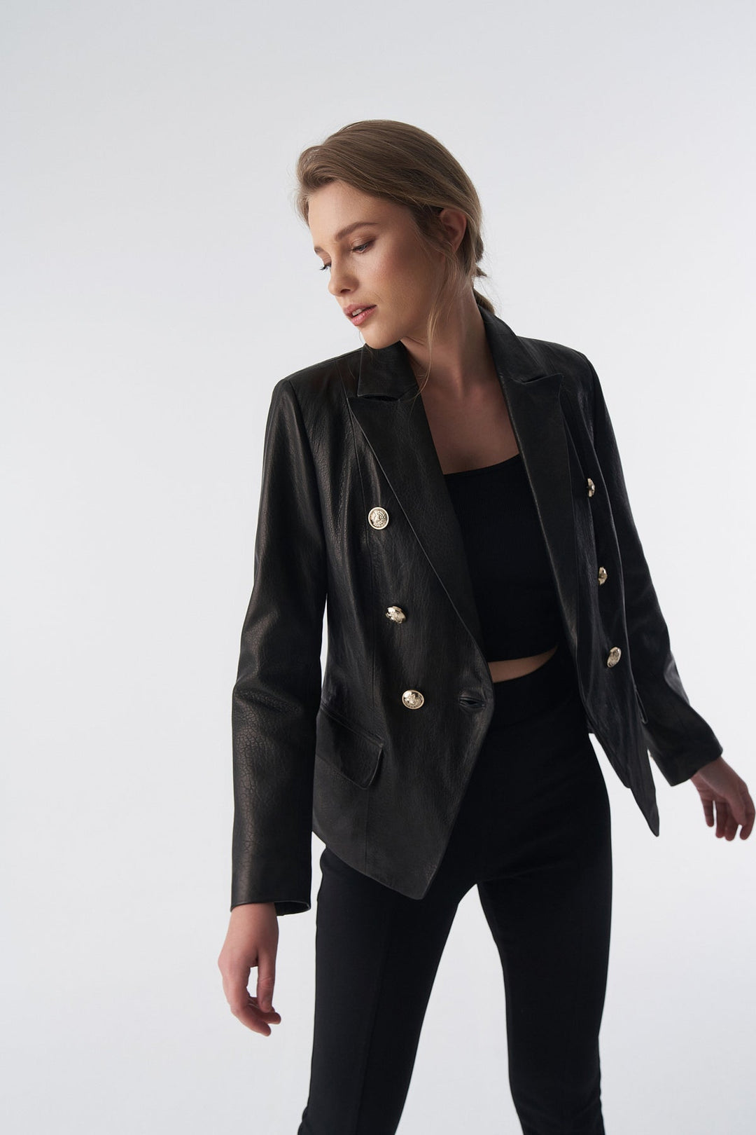 Female model in black leather blazer