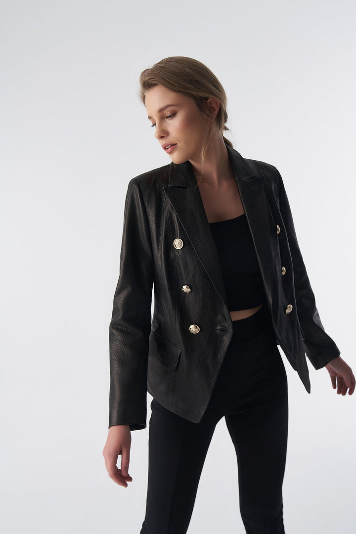 Female model in black leather blazer
