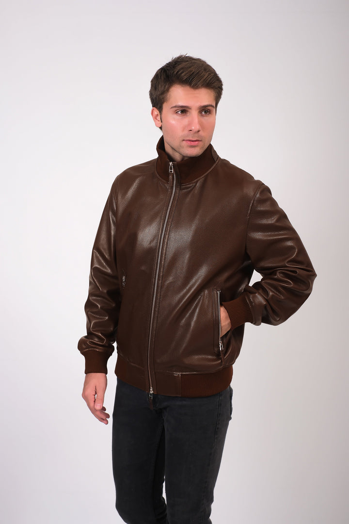 Man wearing brown leather bomber jacket