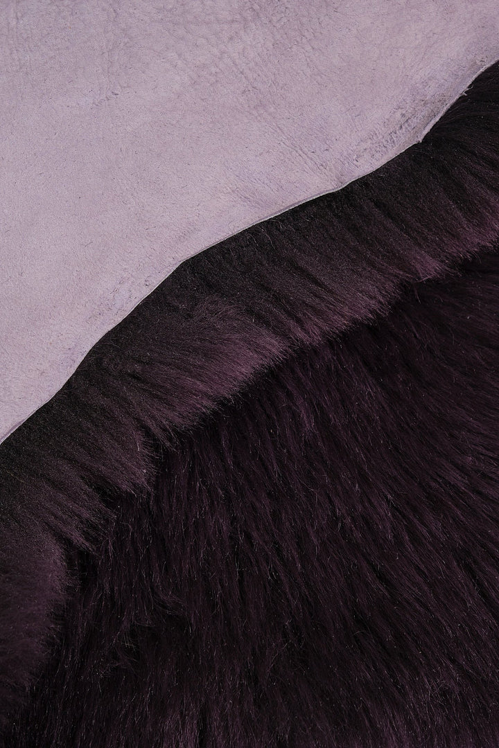 Purple sheepskin rug close-up