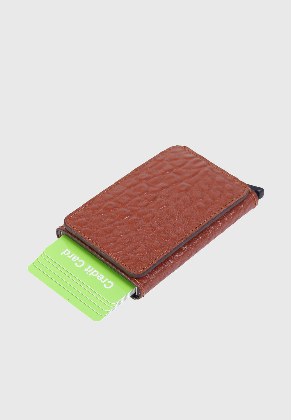 Tan elephant-pattern leather card holder
