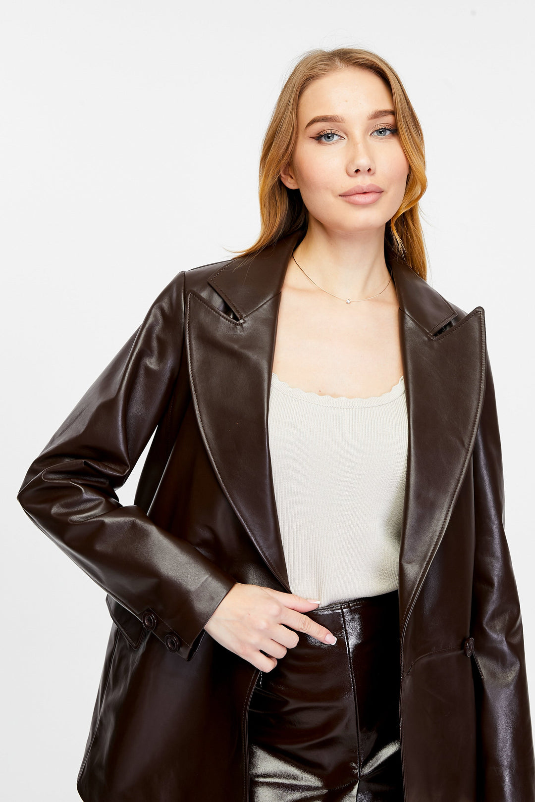 Woman wearing dark brown leather jacket
