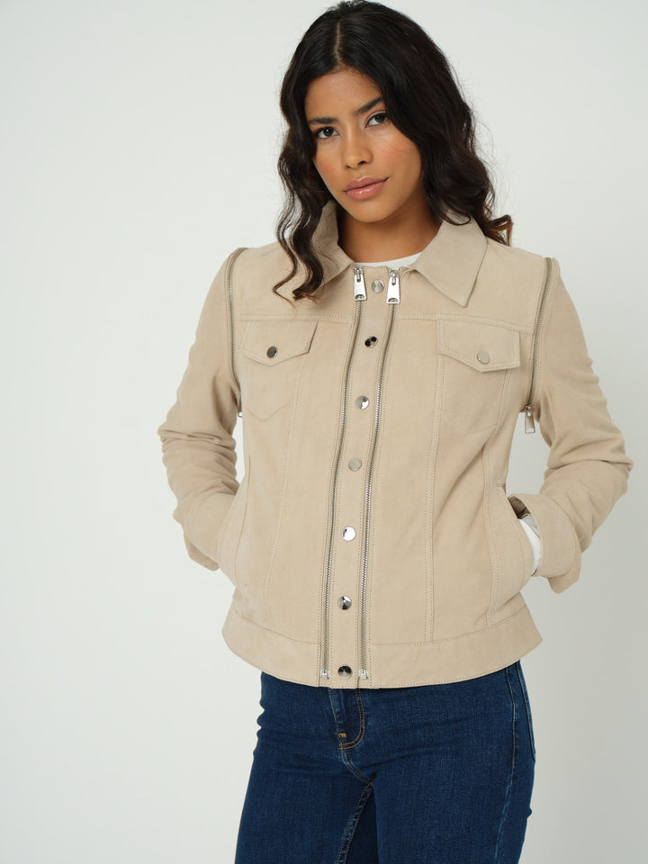 Woman wearing beige suede jacket