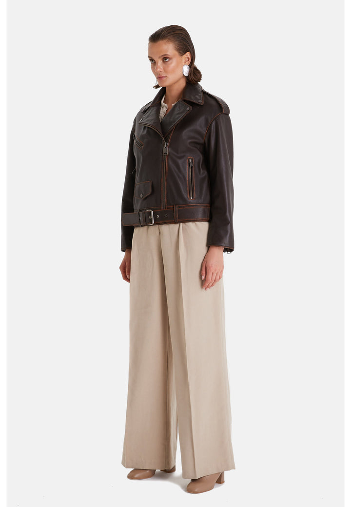 Woman wearing brown leather jacket