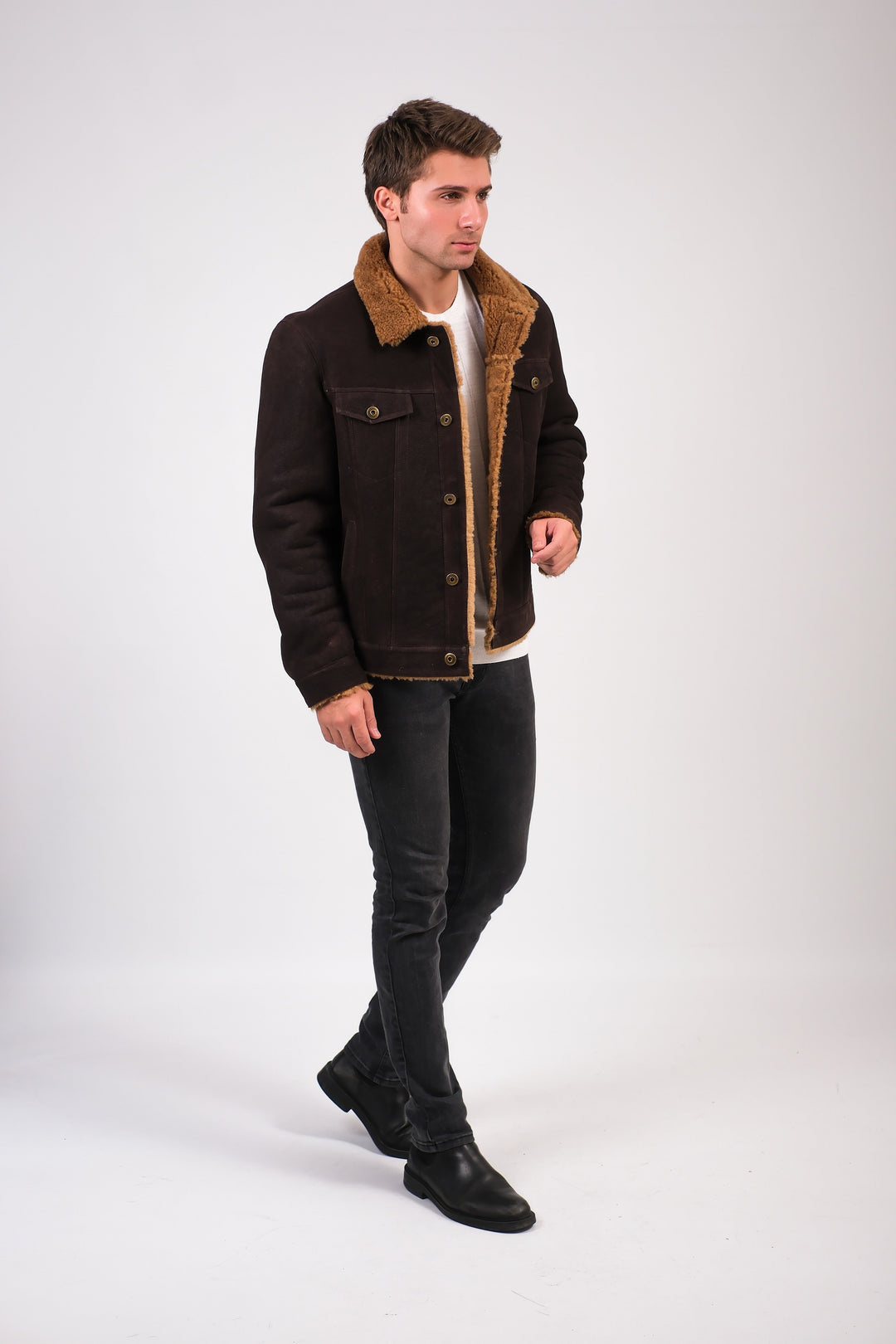 Man wearing brown shearling jacket