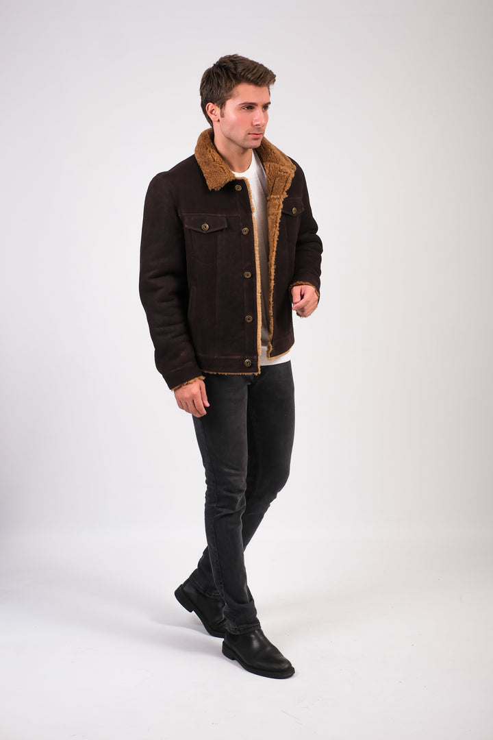 Man wearing brown shearling jacket