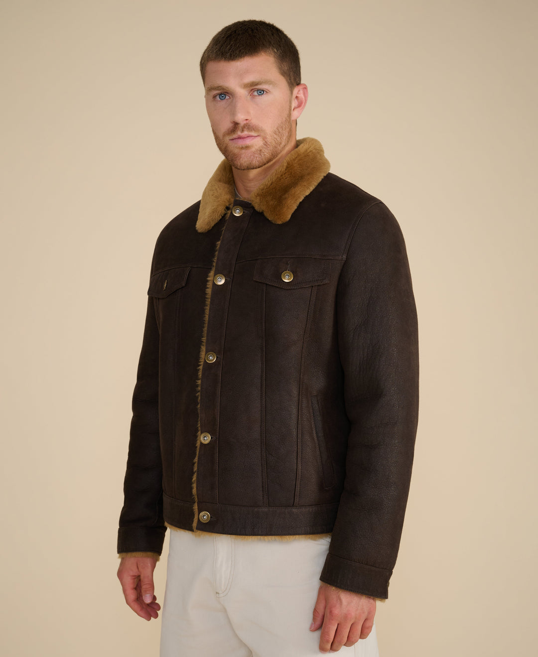 Dark brown shearling jacket with tan collar